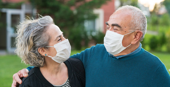 older couple wearing masks